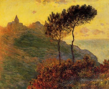  soleil Peintre - L’église de Varengeville contre le coucher de soleil Claude Monet